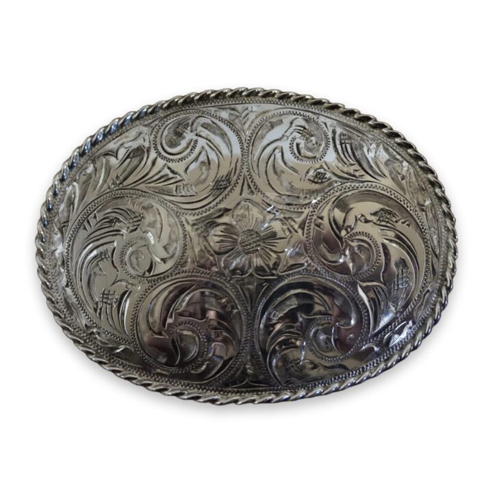 3 by 4 inch hand engraved sterling silver trophy buckle with rope edge and antique finish, on a white background