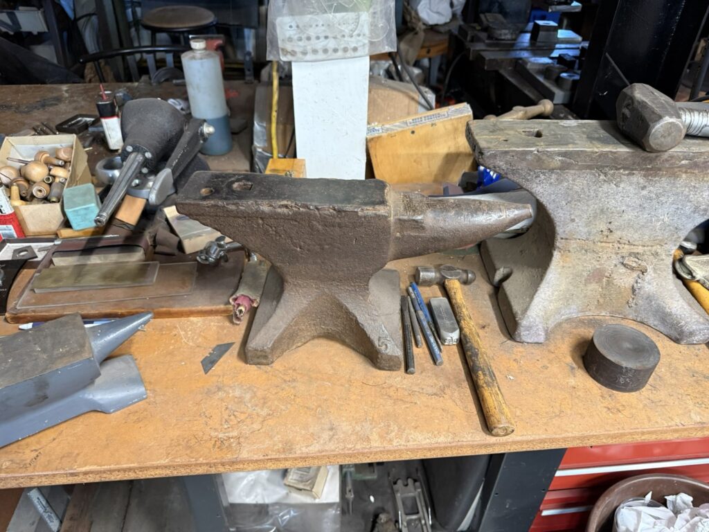 Anvils and hammers on the forming bench